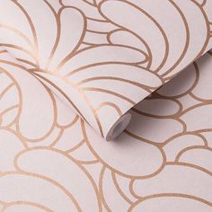 the wallpaper is white and gold with an intricate design on it's surface