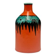 an orange vase with black and green designs on the outside, against a white background