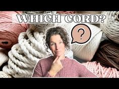 a woman is surrounded by balls of yarn with the words which cord? on it