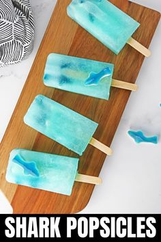 shark popsicles Shark Themed Snacks, Shark Themed Food, Shark Candy, Shark Week Recipes, Gummy Sharks, Pool Party Snacks, Refreshing Summer Recipes, Shark Week Party, Candy Sushi