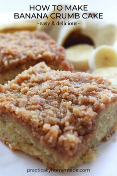 two pieces of banana crumb cake sitting on top of a white plate next to sliced bananas