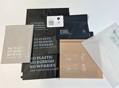 there are many different bags and packages on the table, including one with no plastic