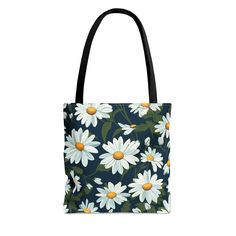 "Are you looking for a cute daisy tote bag? This could be the perfect choice! Whether you order it for yourself or as a gift for someone else, order this daisy bag today! This practical, high-quality tote bag is available in three sizes. All-over print provides comfort with style at the beach or out in town. Made from reliable materials, lasting for seasons. Made with 100% polyester, a medium-weight fabric that is highly durable and perfect for everyday use.  All tote bags come with a non-woven laminate inside and are available in 3 sizes (1x large storage compartment).  Black cotton handles Size tolerance 0.75\"  Returns and Exchanges: All items are custom printed for you so we cannot accept returns or exchanges. If your item is defective, please message us and we will replace it ASAP. We Trendy Floral Print Tote Shoulder Bag, Floral Print Canvas Tote Bag For Everyday Use, Floral Print Canvas Tote Bag For Daily Use, Everyday Floral Print Canvas Tote Bag, Green Floral Print Tote Bag, Everyday Floral Print Tote Bag, Rectangular Canvas Bag With Floral Print For Daily Use, Floral Print Rectangular Canvas Bag For Daily Use, Casual Rectangular Canvas Bag With Floral Print