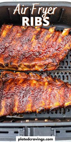 two ribs cooking on an air fryer with the words air fryer ribs above it