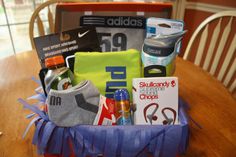 a basket filled with sports items sitting on top of a wooden table