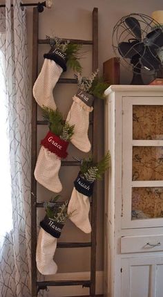 stockings hung on an old ladder in the kitchen