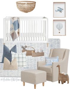 a baby's nursery room with blue and white decor