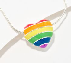 Show your support and share your beliefs with this heart-shaped pendant necklace on display. A colorful enameled rainbow radiates from one side of the heart, while the words "Love Wins" are proudly displayed on the other. From the Joan Rivers Classics Collection®. Pride Heart, Words Love, Heart Shaped Pendant Necklace, Love Wins, Joan Rivers, On Display, Heart Pendant, Rainbow, Pendant Necklace