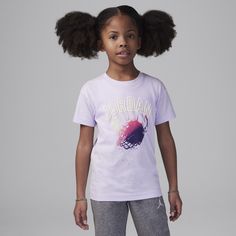 Kids can show off their hoop style in this tee, made of soft jersey knit fabric in a classic cut with a regular fit they can play freely in, the tagless crewneck provides a comfy feel and the timeless design will pair great with any of their favorite Jordan bottoms. Sporty Purple Cotton Tops, Relaxed Fit Graphic Print T-shirt For Playwear, Casual Crew Neck T-shirt For Playwear, Purple Pre-shrunk T-shirt For Spring, Spring Crew Neck T-shirt For Play, Spring Playwear Crew Neck T-shirt, Playful Purple T-shirt With Graphic Print, Playful Purple Graphic Print T-shirt, Sporty Purple Tops With Graphic Print