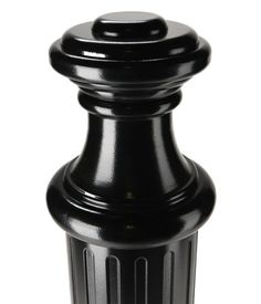 a black plastic bottle with an open top on a white background and clippings to the bottom