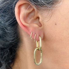 This versatile dangle hoop earrings is composed of 14K solid gold and feature a secure hinged closure for the ease of taking them on and off. The lower link can also be removed and worn as desired. Earring Dimensions: approximately 1.5" (L) x 0.5" (W); i.e. 38mm (L) x 13mm (W) Weight: approximately 4 grams of 14K solid gold for the pair Backing Type: Latch Back Metal Finish: High Shine Polish This design is currently only available in 14K Yellow Gold Please note that this item takes about 3 to 5 Yellow Gold Oval Hoop Earrings With Ear Wire, Yellow Gold Oblong Earrings, Yellow Gold Oblong Hoop Earrings, Earrings Cartilage, Elongated Oval, Tragus Conch, Dangle Hoop Earrings, Jewellery Designer, Affordable Gifts