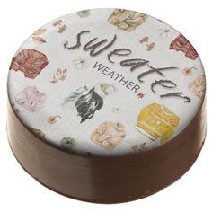 a round cake with the words suitete weather on it's front and side