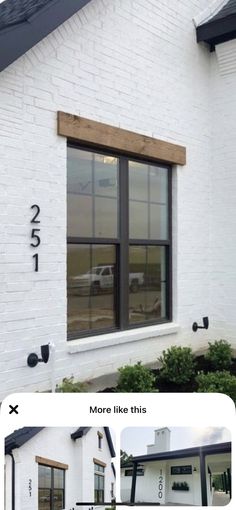 a white brick house with black trim and windows on the front, side and top