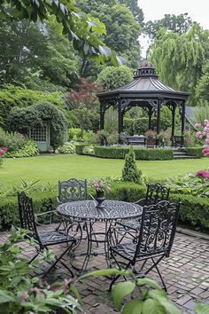 a gazebo in the middle of a garden with tables and chairs