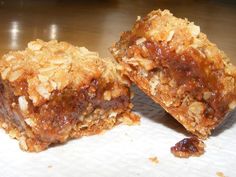 two pieces of food sitting on top of a table