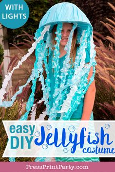 a girl wearing a blue jellyfish costume with text overlay that says easy selyfish costume