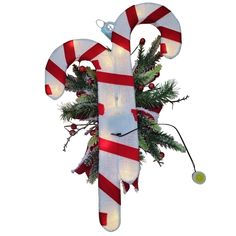 lighted candy cane christmas decoration on white background