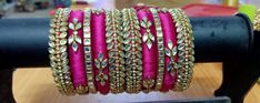 "Traditional Handmade Silk Thread Kundan Stone Studded Bangle Chuda Set Fashion Jewelry For Women Wedding Festive Party Wear Kada Set BANGLE SIZE -  2.4\" Inches, 2.6\" Inches, 2.8\" Inches, 2.10\" Inches Weight - 125 gm  Material: Silk Thread Color: As Per Picture The Bangles are decorated with beautiful stone. It makes your look noble and adds your charming Package include Set Of Silk Thread Bangles Fantastic Hand Kada for weddings, proms, parties or other special occasions * Specially Made For Traditional Occasions. * Used For Hands, It Can Be Reused. * For Bridal bridesmaids." Pink Cutdana Bracelets For Festivals, Festive Pink Cutdana Bracelets, Festive Pink Cutdana Bangle, Festive Pink Bracelet With Gota Work, Festive Pink Bracelets With Gota Work, Pink Cutdana Bangle For Diwali, Zari Work Bangle For Diwali Party, Diwali Party Bangle With Zari Work, Festive Pink Bangle With Gota Work