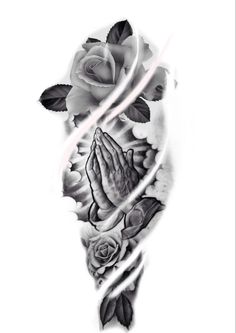 a black and white photo of a rose with praying hands tattoo on the left side of the arm