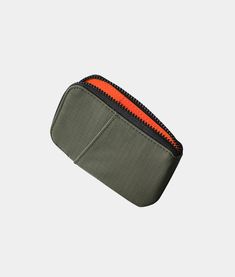 This pocket-sized wonder is great for storing your cards, coins, and loose cash (folded) in one place. Not only is it durable and lightweight, but it also offers great organization options with its front pocket and zippered compartment. And here's the best part - it's compatible with our HUB Ecosystem, allowing you to easily connect it to your backpack strap, sling, or messenger bag for quick access. Prefer a hands-free option? Attach it to your belt and enjoy maximum accessibility while carryin Functional Rectangular Cases With Zipper Pouch, Functional Rectangular Zipper Pouch Case, Functional Cases With Zipper Closure For Daily Use, Functional Pouch With Zipper Pocket For Everyday, Functional Everyday Pouch With Zipper Pocket, Functional Pouch Case With Zipper Closure, Functional Rectangular Pouch With Zipper Closure, Functional Rectangular Zipper Pouch Organizer, Functional Everyday Zipper Pouch