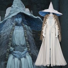 two costumes on display in front of a black background and one wearing a white hat