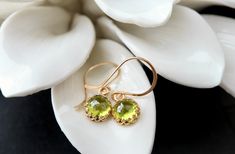 "8mm rose cut, lab created Peridot in an intricate crown bezel setting are suspended from luxe handmade French hooks. Available in your choice of 14k yellow gold fill, rose gold fill, or sterling silver. The gold filled options include premium plated bezels.  :: FIT :: Earrings measure just under 1.5\" in length, including the ear wire. :: RUSH MY ORDER :: 2-day rush processing is available for an additional fee. Use the shipping dropdown menu at checkout to select one of the RUSH options. You o Elegant Peridot Jewelry With Prong Setting, Elegant Peridot Birthstone Earrings, Elegant Peridot Earrings For Wedding, Royal Earrings, Birthday Jewelry, Peridot Earrings, August Birthstone, Birthday Jewelry Gift, August Birth Stone