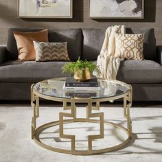 a living room with two couches and a coffee table in front of the couch