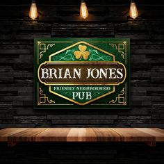 there is a sign that says bran jones pub on the wall in front of a wooden table