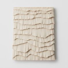 a piece of wood with wavy lines on it