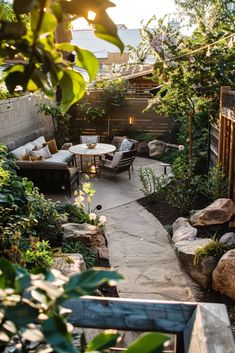 an outdoor patio with seating and landscaping