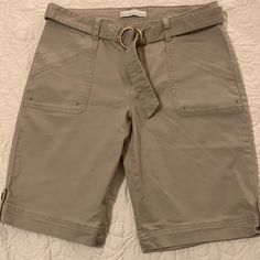 Cargo Style Bermuda Length Mid Weight Cotton Shorts With A Little Stretch. Comes With Belt Still Attached. Perfect Condition. Never Worn. Lots Of Detail On Pockets And Hem. Size 6. Color Khaki. Measurements In Pics. Will Consider Offers. Utility Bermuda Bottoms With Built-in Shorts, Casual Short-length Capris With Pockets, Casual Short Length Capris With Pockets, Casual Short Capris With Pockets, Spring Mid-rise Bermuda Shorts With Pockets, Spring Capris With Pockets And Short Leg, Casual Cotton Capris With Short Leg, Casual Short Leg Cotton Capris, Casual Bermuda Shorts With Belt Loops