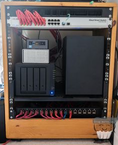 a computer case with many wires attached to it