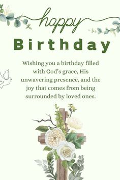 a cross with flowers on it and the words happy birthday written in green lettering,