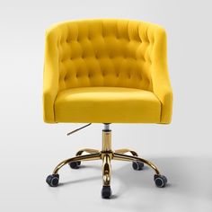 a yellow office chair with wheels and casteors on an isolated white background in the studio