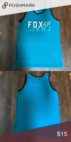 Fox tank Fox brand boys tank in deep teal with black trim detail. Slim fit, boys medium. 50/50 cotton/poly blend. NWOT. Fox Shirts & Tops Tank Tops Casual Blue Tank Top For Playwear, Fox Shirts, Fox Brand, Fox Shirt, Deep Teal, Trim Detail, Black Trim, 50 50, Shirts Tops