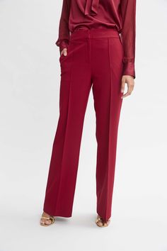 Meet the pant of the season! Our wide leg Fluid Crepe Pant features a high-rise waist, pintuck details and side zip closure. We love these pants worn with its matching double-breasted blazer or with luxe silk satin or knits. Elie Tahari Exclusive Wide Leg Pant 71% Polyester, 21% Viscose, 8% Elastane Runs true to Size Model is 5'9" and wearing size 2 Measurements: Front Rise: 12"L , Inseam: 33.5'L (approx. length for size 6) Dry Clean Only Imported Style #: E9011204 Jumpsuit Jacket, Long Sleeve Short Dress, Wide Leg Pant, Elie Tahari, Breasted Blazer, Knit Tees, Denim Coat, Knit Jacket, Cardigan Jacket