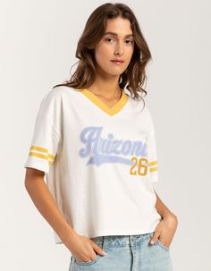 Rsq Arizona V-Neck Tee. Graphic Screened On Front, And Two Stripes On The Sleeves Give It A Sporty Edge. Features A Ribbed V-Neckline And Relaxed Fit. 100% Cotton. Machine Wash. Imported. Model Is Wearing A Size Small. Model Measurements:height: 5'8" Bust: 34"waist: 25"hips: 37.5" Cotton V-neck Top With Letter Print, Sporty V-neck Top For College, College V-neck Graphic Print T-shirt, Spring Graphic Tee With V-neck, V-neck Graphic Print Tee, White Graphic Print V-neck Top, Sporty V-neck Top With Letter Print, Sporty V-neck T-shirt For Spring, V-neck Graphic Print T-shirt For College