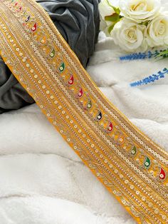 Bridal Golden Indian Zari Colour Fabric Saree Dupatta Craft Sewing Sash Belt Headband Lace Trim Border  Sari border embroidered with Gold Traditional Trim Border Lace Champagne stone Work for Sari border., Condition --New Item Code --  JA6526 - FG04-3 Size - 9.8cm / 3.85 Inch  approx. Material -- Fabric Sale for --9.5 Yards USED FOR Craft Projects  Designing  Home Decoration  Festive celebrations.  Occasional apparels  Evening and party Apparels.  Home decor items Apparel & Fashion  Scarves n St Gold Embroidered Fabric For Festival, Traditional Gold Embroidered Fabric For Festival, Traditional Gold Embroidered Fabric For Celebration, Golden Embroidered Fabric With Handwork For Festivals, Traditional Yellow Embroidered Fabric, Yellow Bollywood Style Embroidered Fabric With Border, Traditional Gold Embroidered Fabric With Mirror Work, Traditional Yellow Embroidered Fabric With Motifs, Border Lace