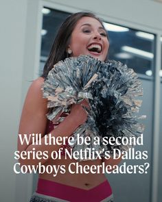 a woman holding a cheerleader's pom - pom in front of her face