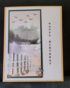 a happy birthday card with birds flying over the water