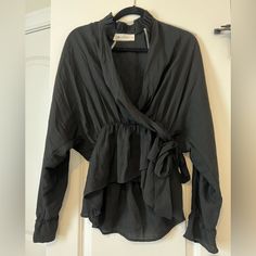 New With Tags! Wrap Style Top With A Tie On The Side. Long Sleeve But Very Breathable & Light Weight. Versatile Wrap Blouse For Day Out, Versatile Black Blouse For Day Out, Black Wrap Blouse For Spring, Black Wrap Tops For Spring, Black Wrap Blouse For Fall, Fall Black Wrap Blouse, Wrap Blouse, On The Side, Wrap Style