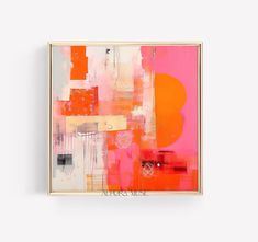 an abstract painting in pink, orange and yellow on a white background with gold frame