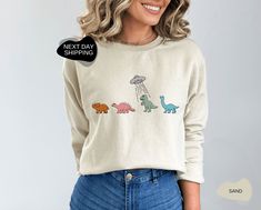 "Funny Sweater, Dinosaur Sweatshirt, Dinosaur Sweater, Dino Sweatshirt, Retro Dinosaur Sweatshirt, Retro Dinosaur Sweatshirt, Dinosaur, Hoodies and Sweaters 📣 Please check all photos for details. 📣 Use \"Add message to Seller\" link on the checkout page to send a message or important details for your order. 📣 We use Bella Canvas and Gildan when we have a shortage of stocks. 📣 Our printing method is Decal Printing, Premium Vinyl and Heat Press. 📣 How Do I Order? - Please check all size chart Long Sleeve Cotton Tops With Dinosaur Print, Long Sleeve Cotton Top With Dinosaur Print, Cotton Long Sleeve Tops With Dinosaur Print, Long Sleeve Top With Dinosaur Print For Fall, Cotton Tops With Dinosaur Print For Fall, Cotton Top With Dinosaur Print For Fall, Casual Dinosaur Print Tops For Fall, Casual Dinosaur Print Crew Neck Sweatshirt, Unisex Dinosaur Print Crew Neck Top