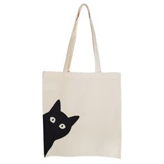 a tote bag with a black cat on it