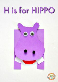 a purple hippo paper cut out with the words h is for hippo