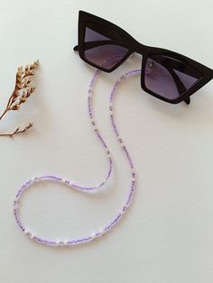 An elegant Eyeglass chain for your sunglasses or reading glasses. Approximately size of the chain is 65cm. It comes with a glasses connector that is removable. Beaded Clear Glass Glasses Chains, Clear Beaded Glass Glasses Chains, Purple Glass Glasses Chains As Gift, Beaded Clear Glasses Chains As Gift, Gift Beaded Clear Glasses Chains, Beaded Clear Glasses Chains Perfect For Gifts, Sunglasses Strap Diy, Beaded Glasses Chain, Beaded Glasses