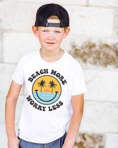 Our Beach More Worry Less Smiley Retro Tee comes in Baby, Toddler, and Youth sizes. Please see the photos section for size charts. Playful Letter Print Top For Vacation, Summer Cotton Tops For Family Vacation, Playful Short Sleeve Tops For Beach Season, White Top For Family Vacation And Beach Season, White Top For Family Vacation During Beach Season, Cute Beach Season Shirt, Playful Letter Print Top For Beach, Fun Cotton Tops For Family Vacation, Playful White Tops For Beach