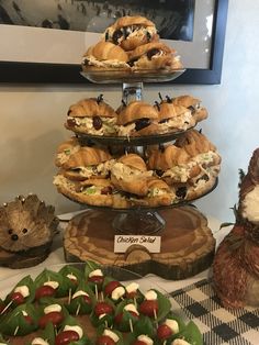 there are many pastries on the trays with teddy bears sitting next to them