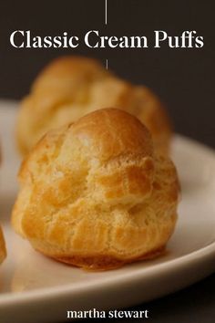 three cream puffs on a plate with the words classic cream puffs