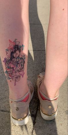 a person with a tattoo on their leg